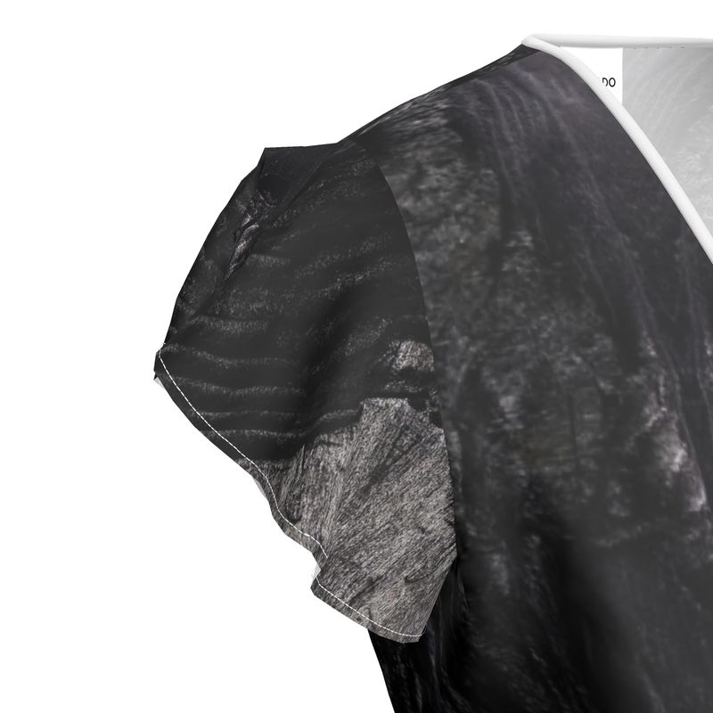 Tea Dress:Charcoal formed approximately 50,000 years ago when lava from a Washington State volcano engulfed tree, carbonizing it.