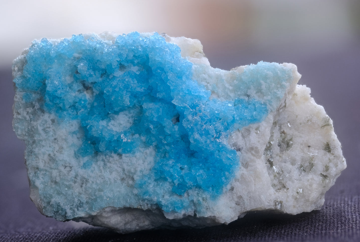 Rare blue hyalite opal from the famous Chalk Mine in Spruce Pine, NC. 